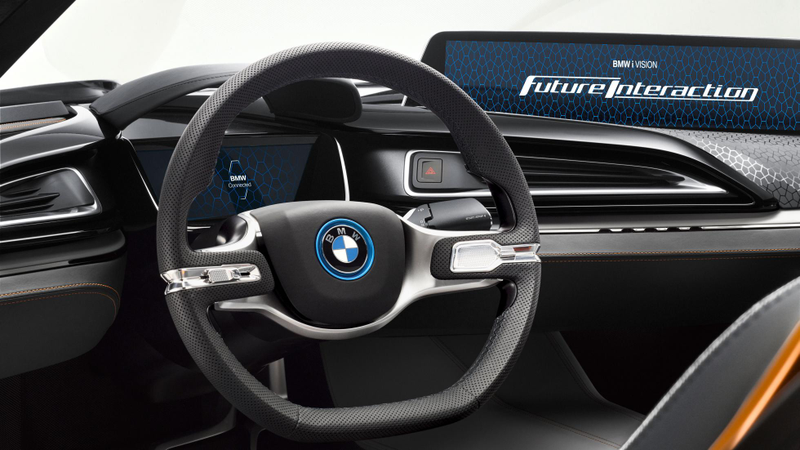 Illustration for article titled This BMW Concept Says No To Doors And Yes To A Huge Gesture-Controlled Screen